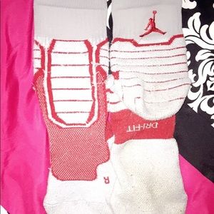 Gray and red Jordan socks